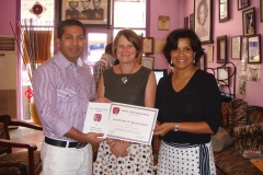 Mr. Sadik Mohammad Chowdhury, MD of L.A.I.D receiving Certificate of Appreciation from Lao Women International Group.