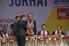 Mr. Sadik Mohammad Chowdhury, MD of L.A.I.D presenting Lao Souvenir to Honorable Chief Minister of Assam Shri Tarun Gogoi at Inauguration Ceremony of Assam International Trade & Industrial Fair, Jorhat, Assam, India on 19 Feb 2015.